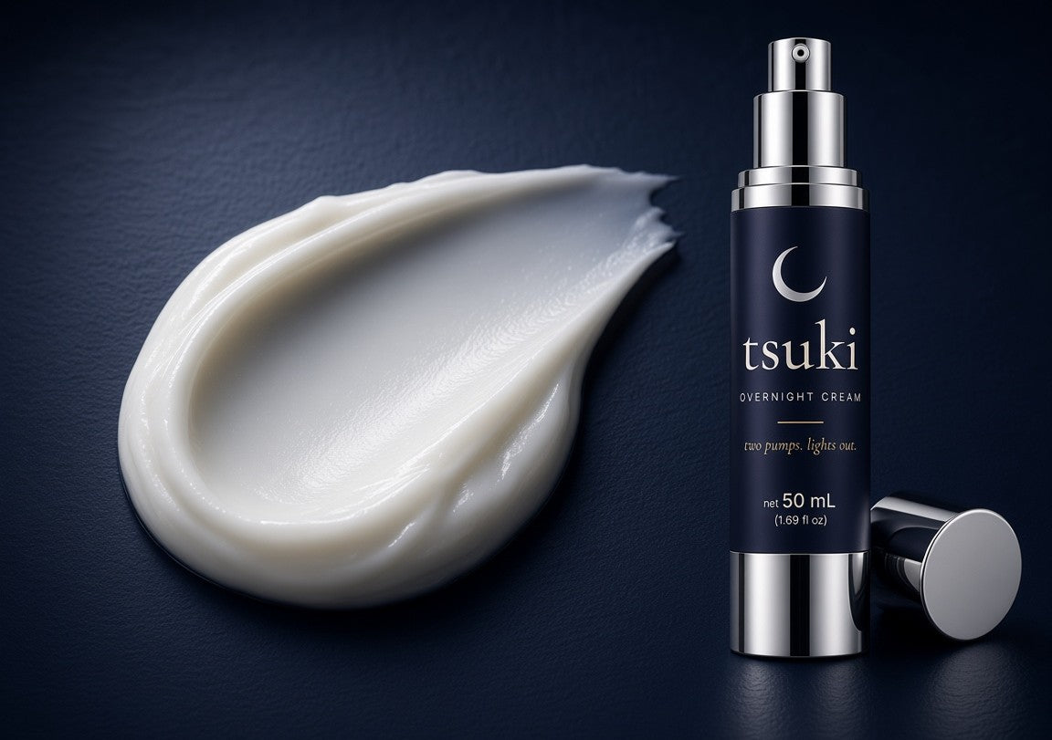 a swirl of rich white cream next to the open tsuki bottle